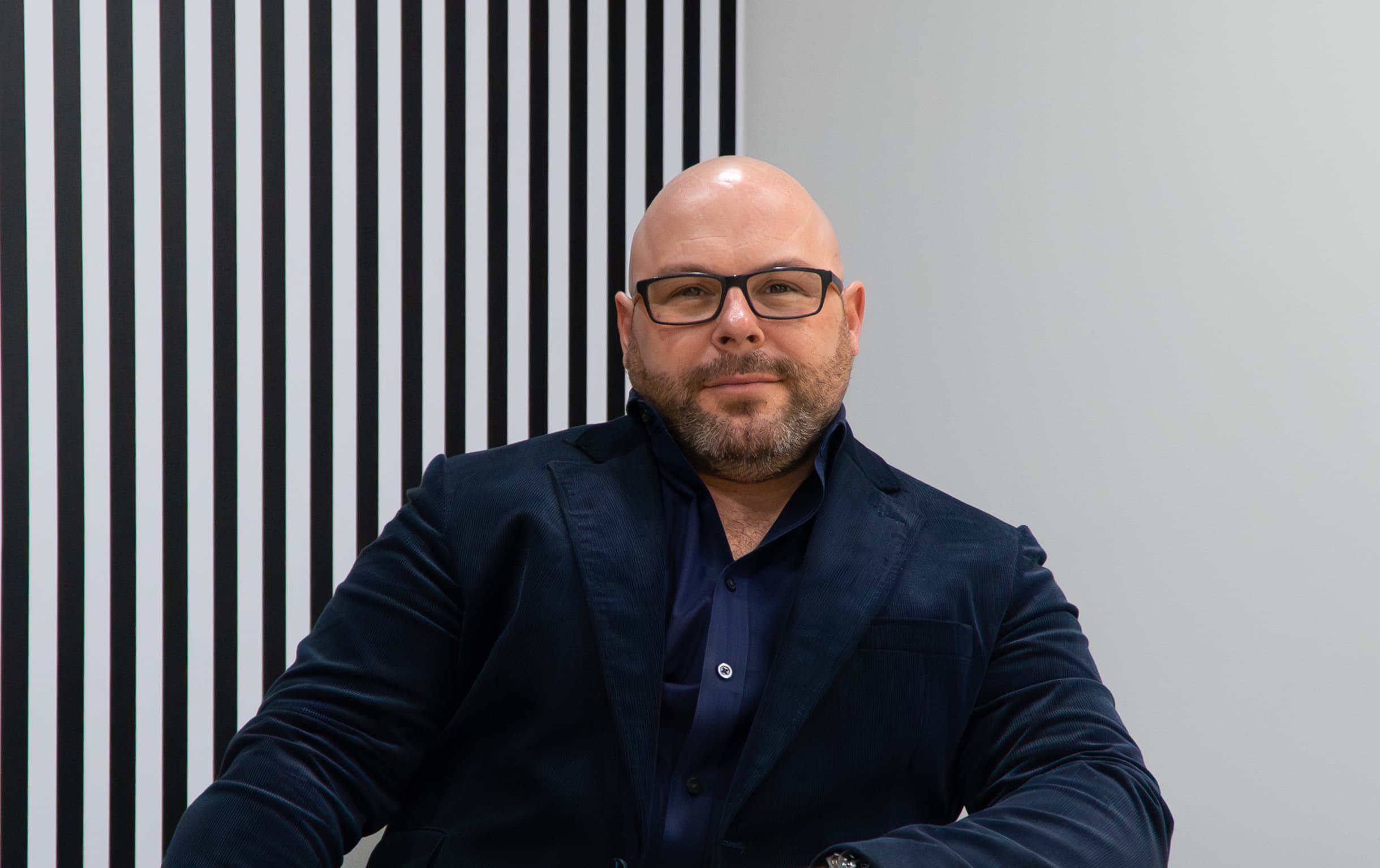 man with glasses in suit