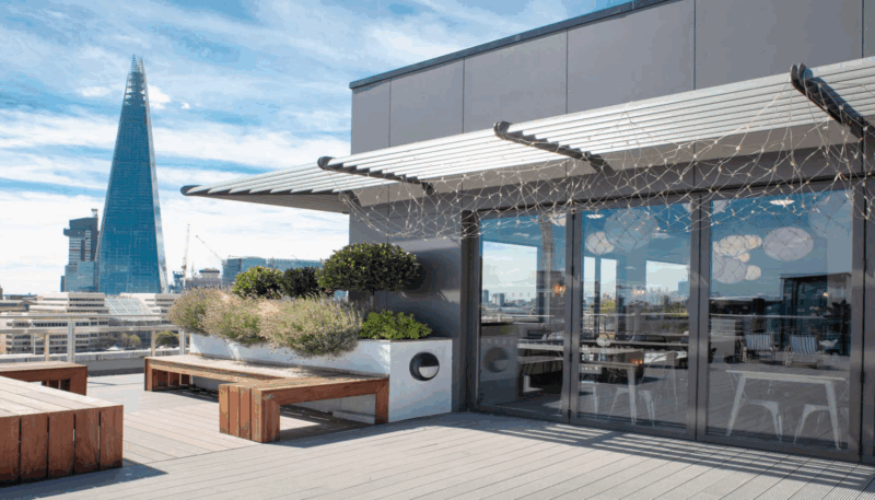 Rooftop venue hire in Monument London EC3R, highlighting The Deck at OSiT 20 St Dunstan's Hill for corporate summer parties, networking events, and client entertainment.