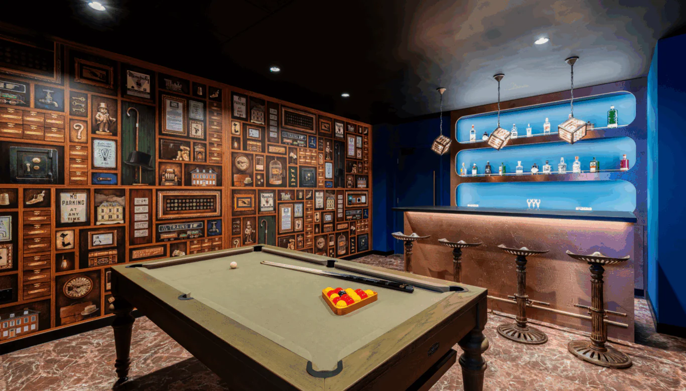 Alt Text: Mr M’s Cabinet of Curiosities speakeasy and games room at our boutique office space to rent in Liverpool Street London.