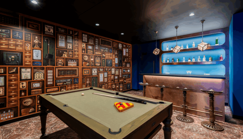 Alt Text: Mr M’s Cabinet of Curiosities speakeasy and games room at our boutique office space to rent in Liverpool Street London.