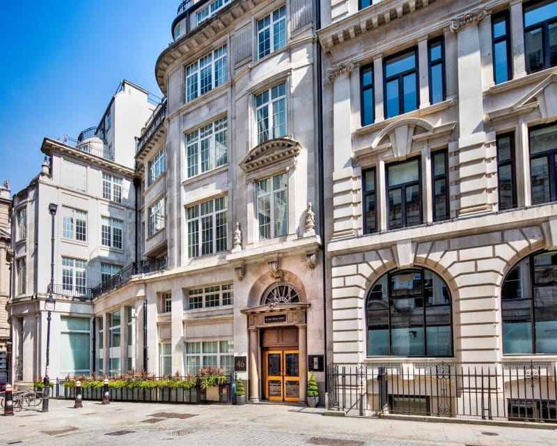 Exterior entrance of Office Space in Town Liverpool Street located on New Broad Street, showcasing the professional doorway to our high end serviced offices near Liverpool Street Station.