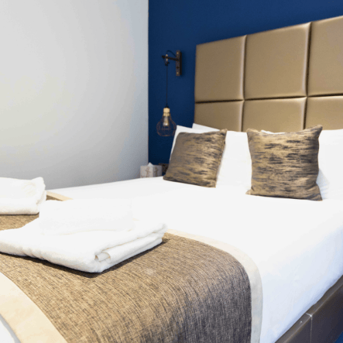 A luxury serviced bedroom at Office Space in Town Monument, featuring boutique hotel-standard interiors and high-end finishes for overnight business stays at 20 St Dunstan’s Hill, EC3R.
