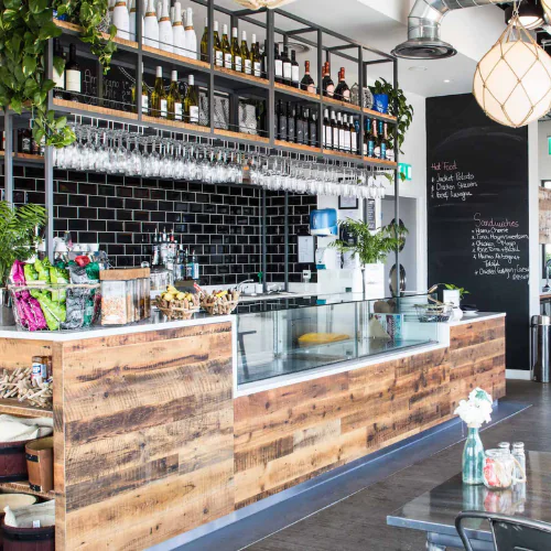 Rooftop bar and cafe for hire in London EC3R, showcasing The Deck Bar at Office Space in Town Monument with panoramic views and premium boutique amenities at 20 St Dunstan’s Hill.