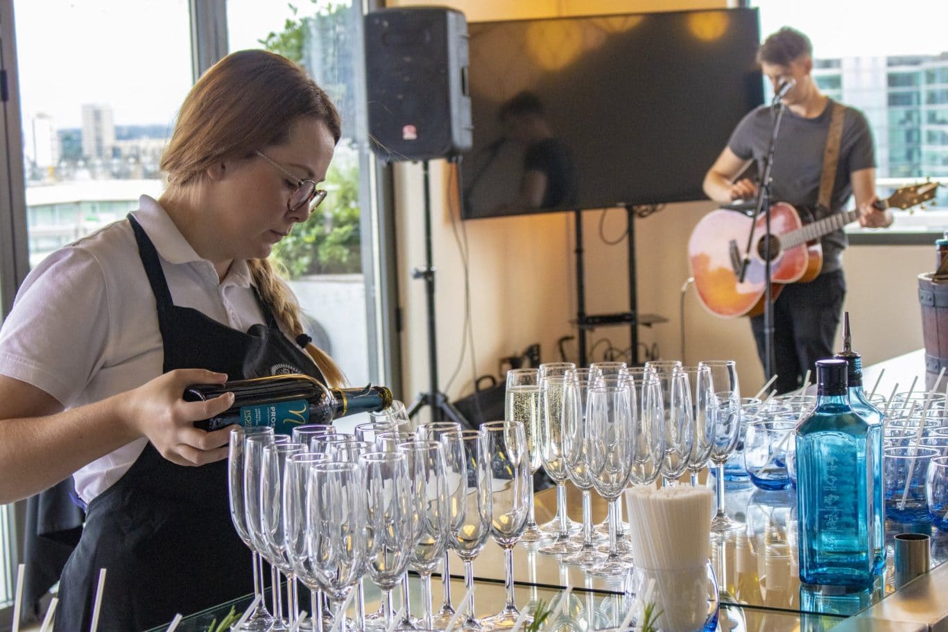 Rooftop venue hire in London EC3R near Monument Station, highlighting The Deck at OSiT for corporate summer parties and professional events with views of The Shard and Tower Bridge.
