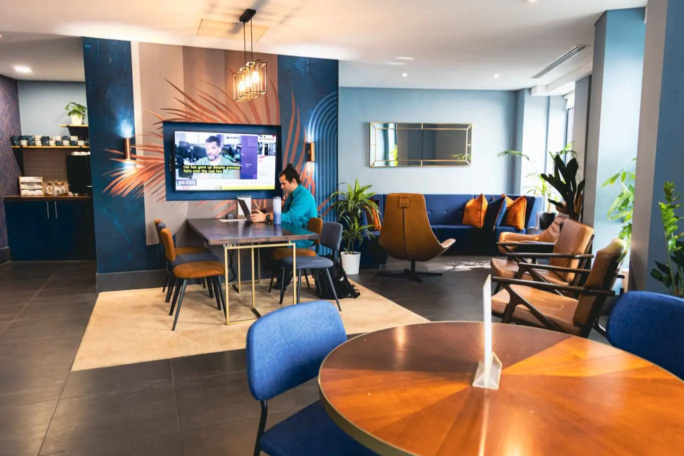 Luxury office lounge in London EC1A near St Paul's Cathedral, highlighting the high-end literary-themed social space and premium boutique furnishings at Office Space in Town 20 Little Britain.