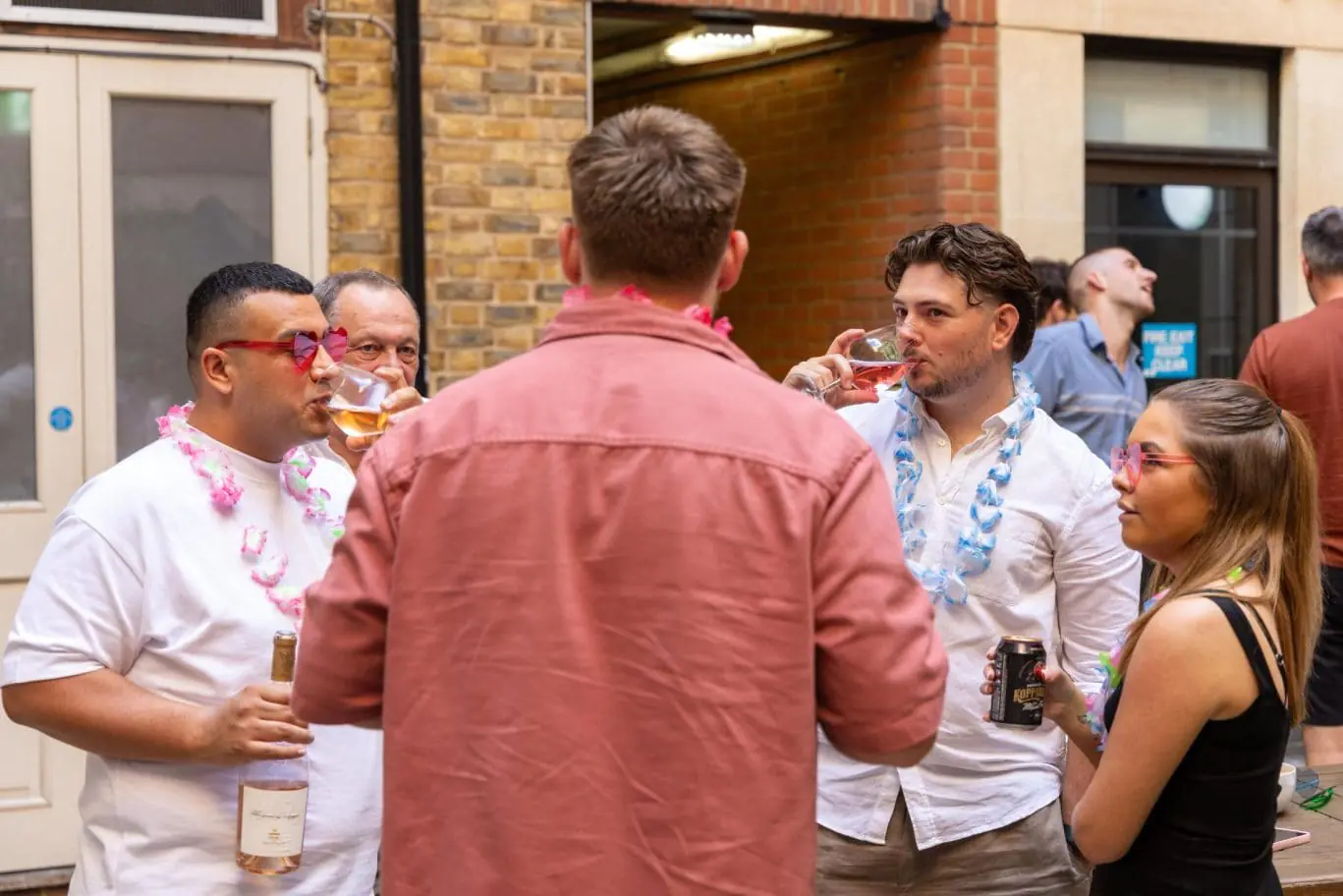 Private courtyard venue hire in London EC1A, highlighting the exclusive outdoor event space at OSiT St Paul's near Smithfield Market for summer parties, client networking, and social gatherings.