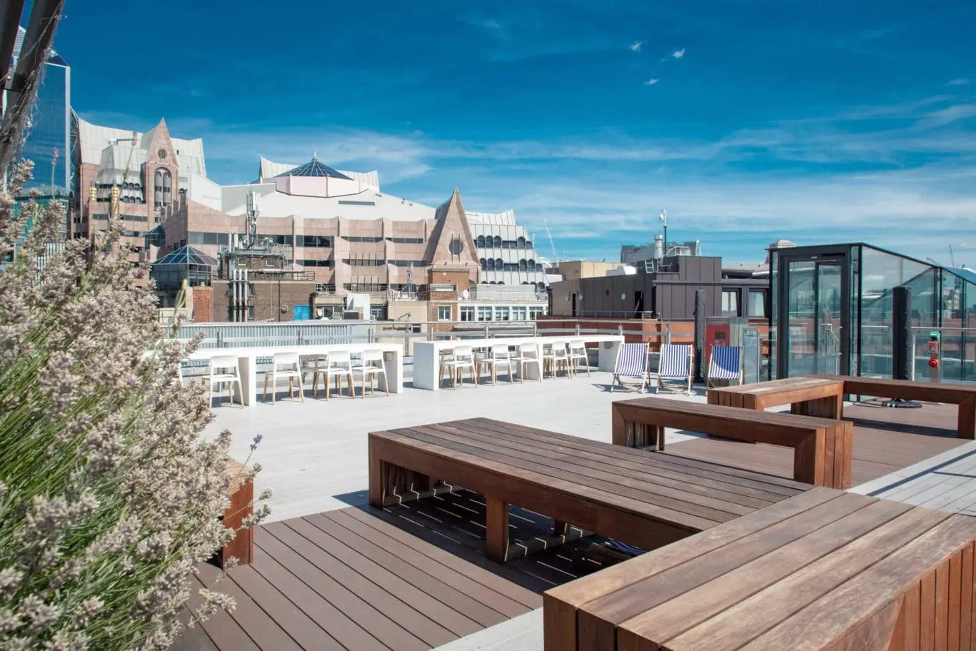 Rooftop event venue hire in London EC3R, highlighting the luxury nautical-themed outdoor terrace at OSiT Monument for summer parties, networking events, and high-level business socials near London Bridge.