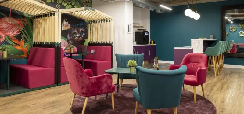 A vibrant and flexible communal lounge at Office Space in Town Waterloo, offering creative breakout zones and informal meeting spaces for team collaboration and networking within a boutique office setting.