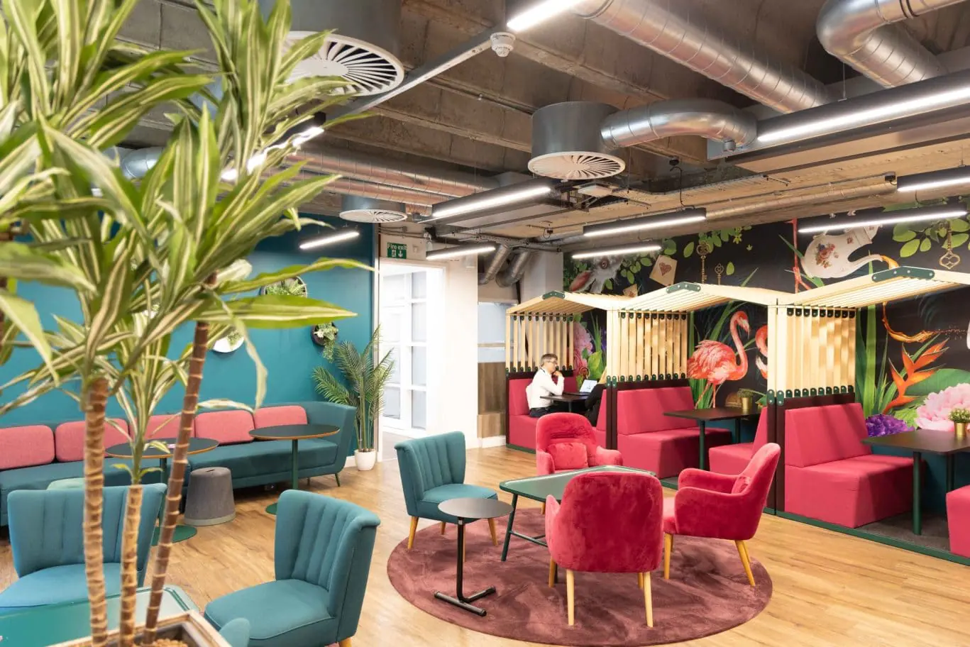 Luxury office lounge in London SE1 near Waterloo Station, highlighting the imaginative Alice in Wonderland themed social spaces and premium boutique amenities at Office Space in Town 2-6 Boundary Row.