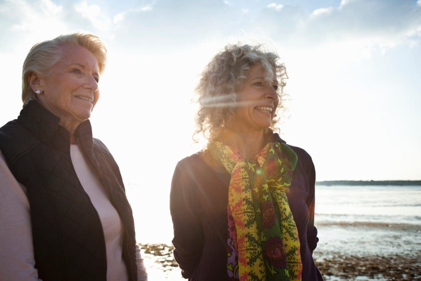 mother-and-daughter-enjoying-view-on-beach-2025-10-28-21-52-45-utc