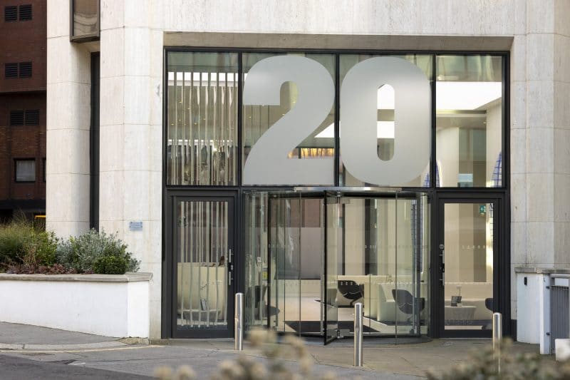 Luxury serviced office entrance in London EC3R, highlighting the prestigious OSiT Monument building frontage for corporate professionals near Monument Station.