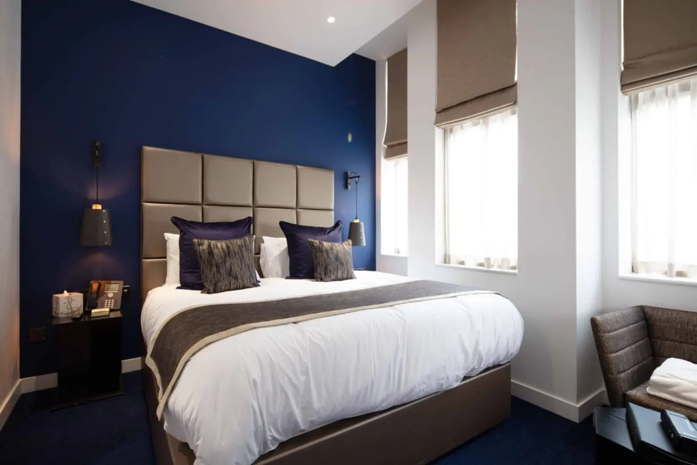 Luxury serviced apartments and bedrooms in Monument, London EC3R, highlighting the unique nautical themed guest rooms at OSiT 20 St Dunstan's Hill for short stay business travelers.