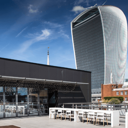 Rooftop venue hire in Monument London EC3R, highlighting The Deck at OSiT 20 St Dunstan's Hill for corporate summer parties, networking events, and client entertainment.
