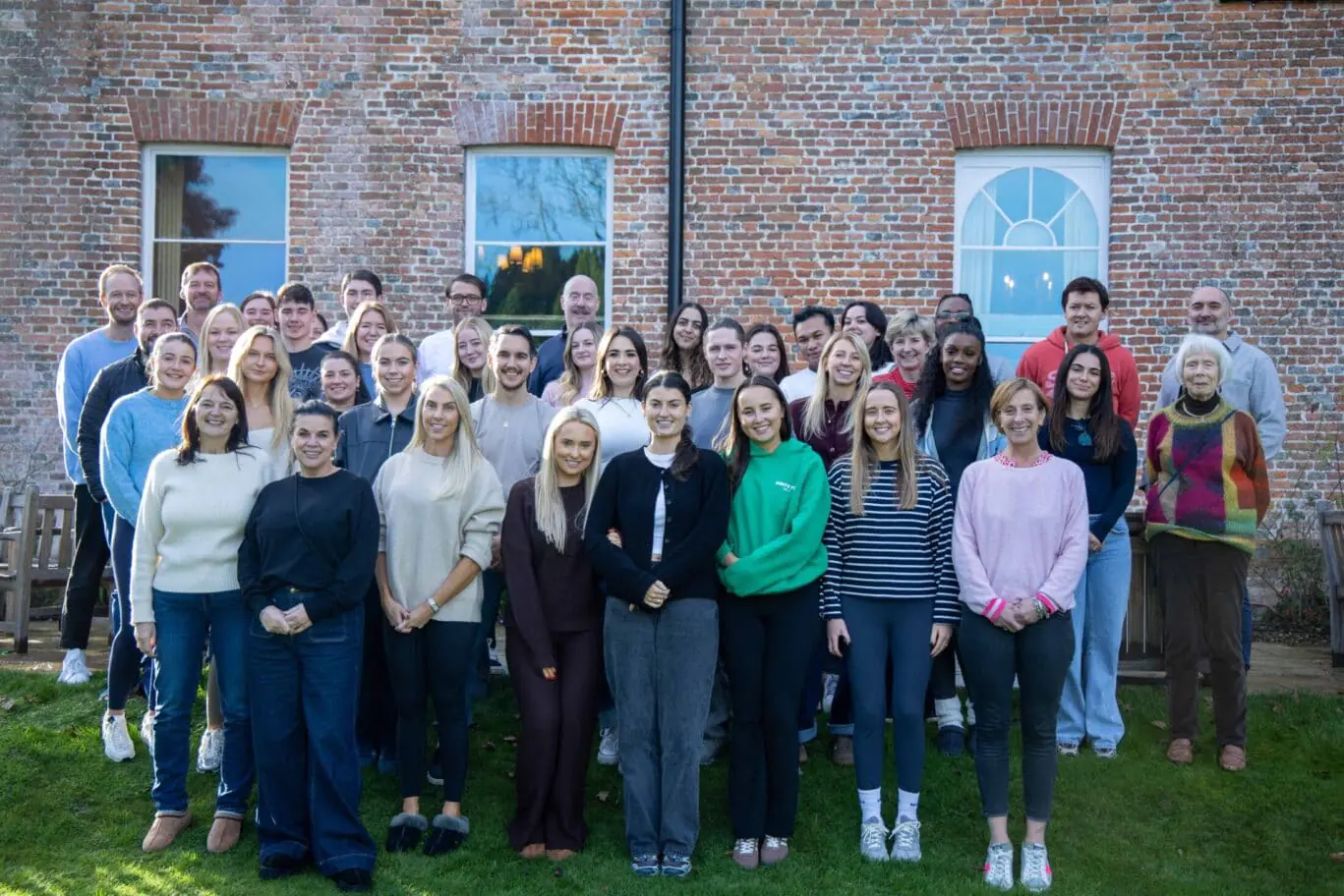 A group photo of the Office Space in Town team, known as the OSiTeers, representing the professional and friendly support staff at our award winning boutique serviced offices in London and the UK.