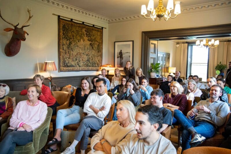 A large group photo of the OSiTeers during the annual Office Space in Town weekend away, celebrating the strong team culture and family values that drive our boutique office success.