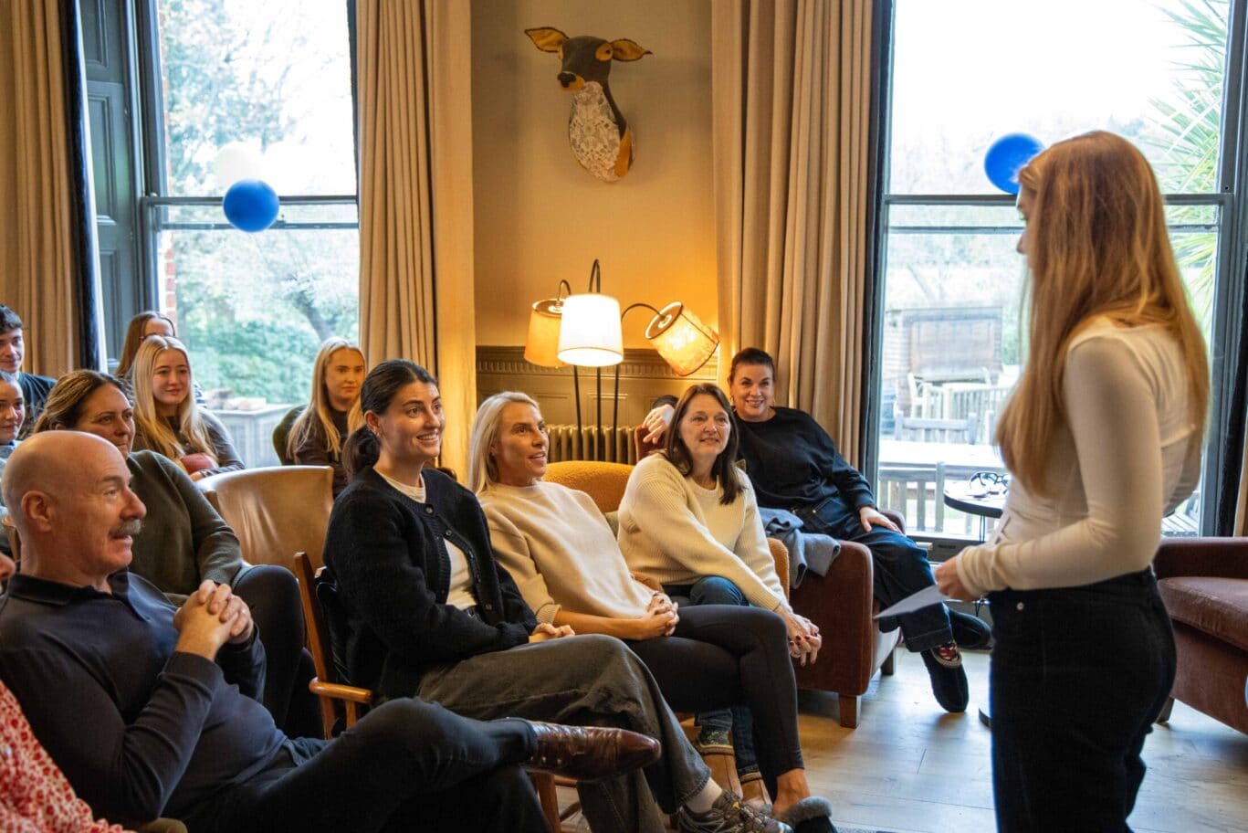 A candid team picture of the OSiTeers during a weekend retreat, highlighting the family-run culture of Office Space in Town and our commitment to employee wellbeing.