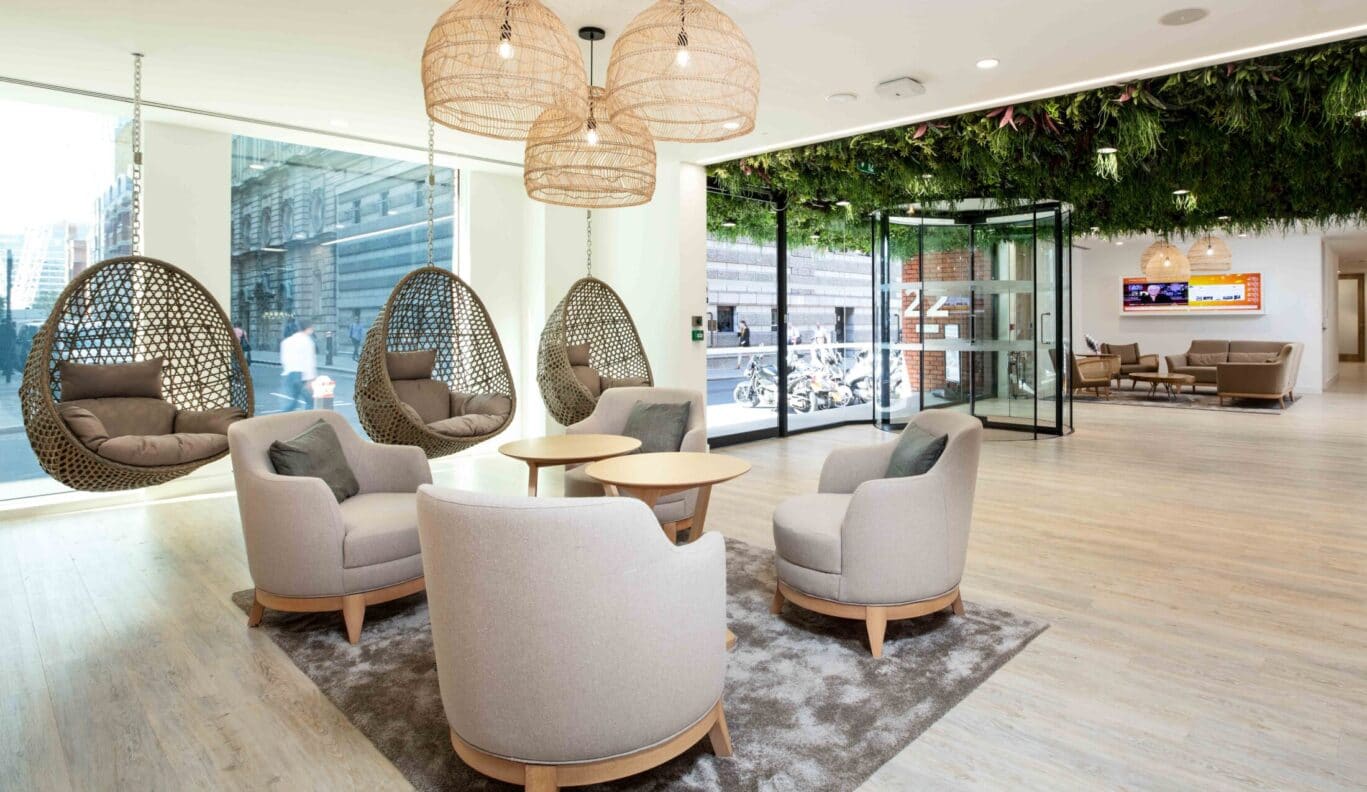 Luxury serviced office reception in Blackfriars London EC4Y highlighting the unique biophilic entrance at OSiT 22 Tudor Street for corporate guests and legal professionals.