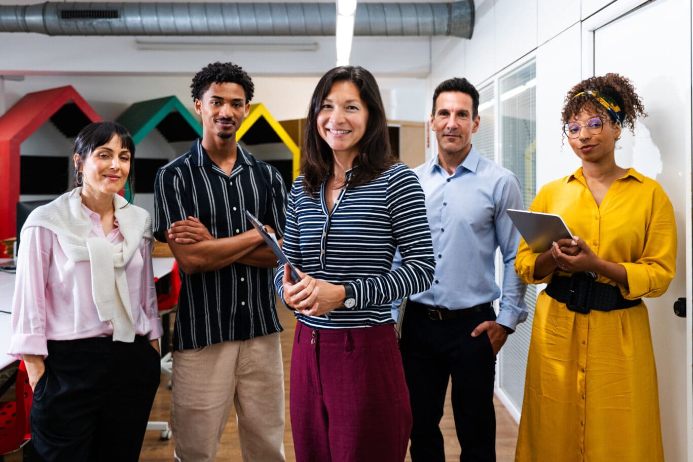 Startup business team posing in modern office